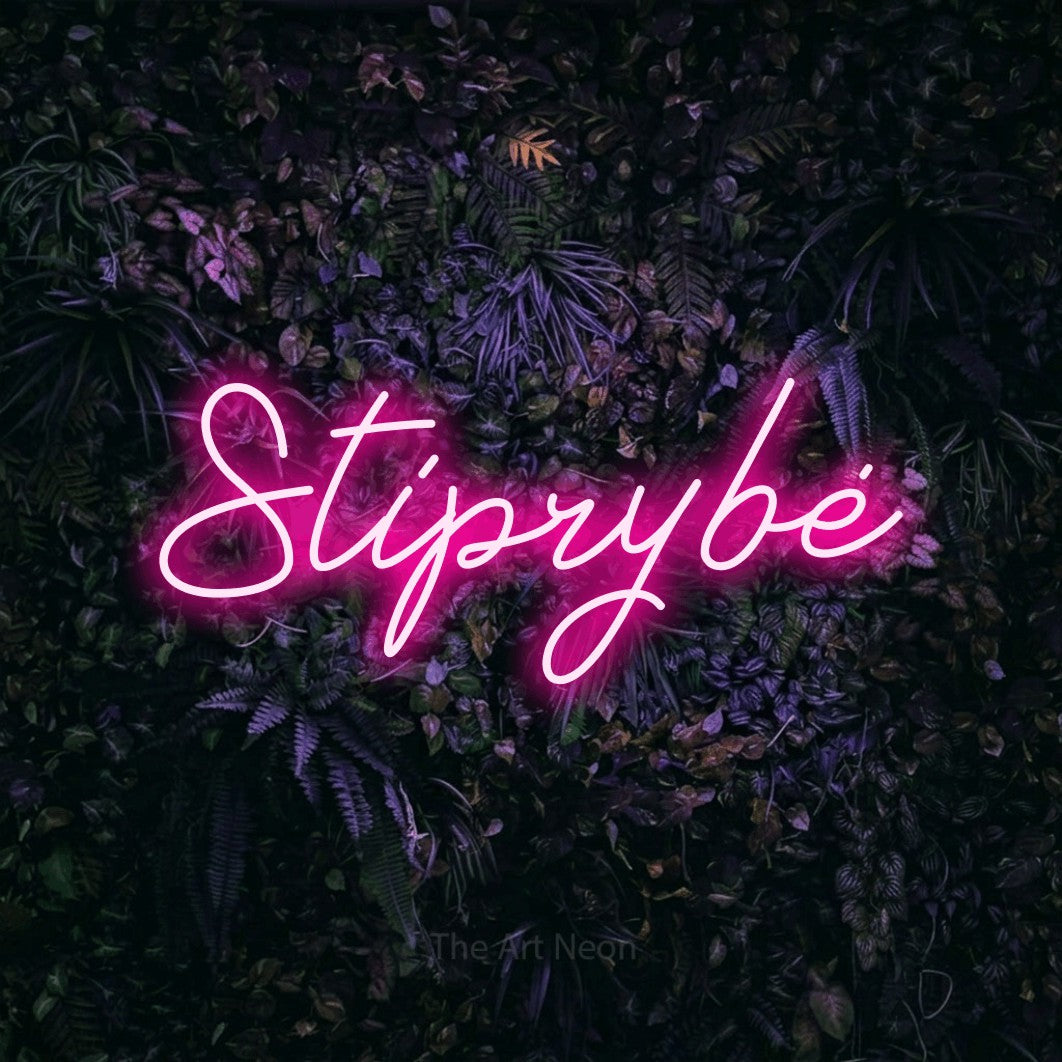 LED neon sign reading “Stiprybė”, arranged in a single line.