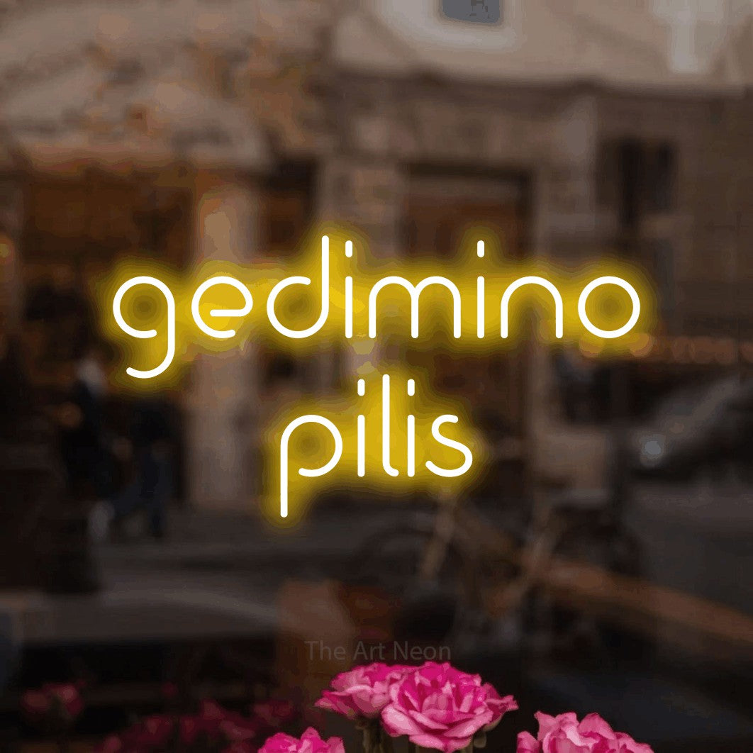 LED neon sign reading “gedimino pilis”, arranged in two lines.