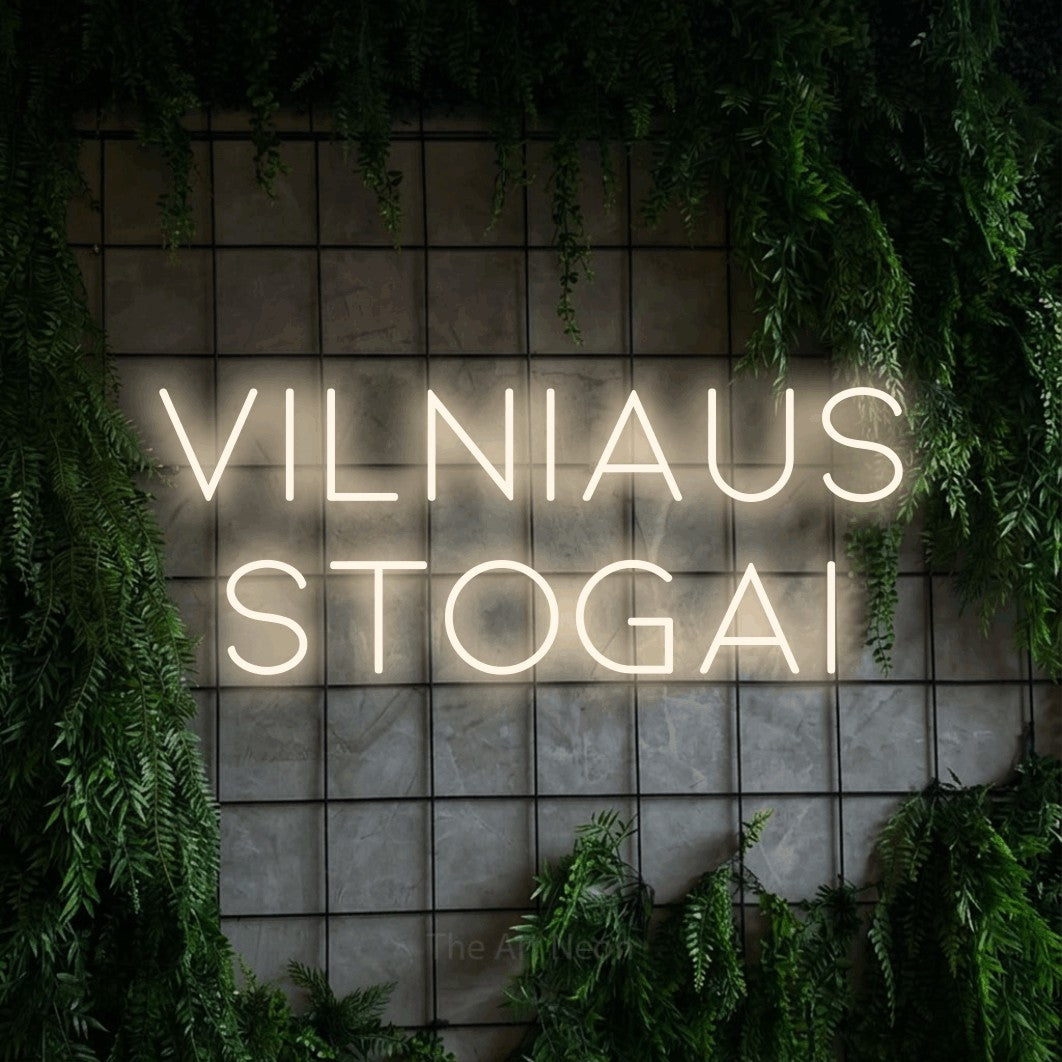 LED neon sign reading “Vilniaus Stogai”, arranged in two lines.