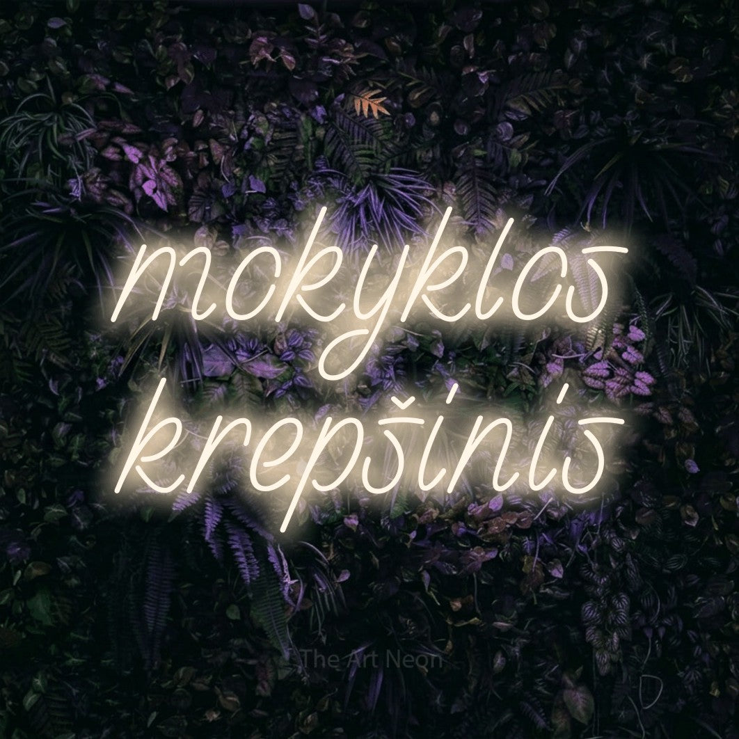 LED neon sign reading “mokyklos krepšinis”, arranged in two lines.