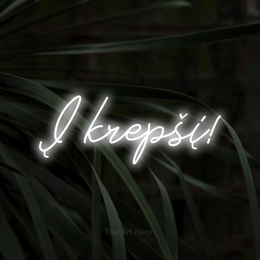 LED neon sign reading “Į krepšį!”, arranged in a single line.
