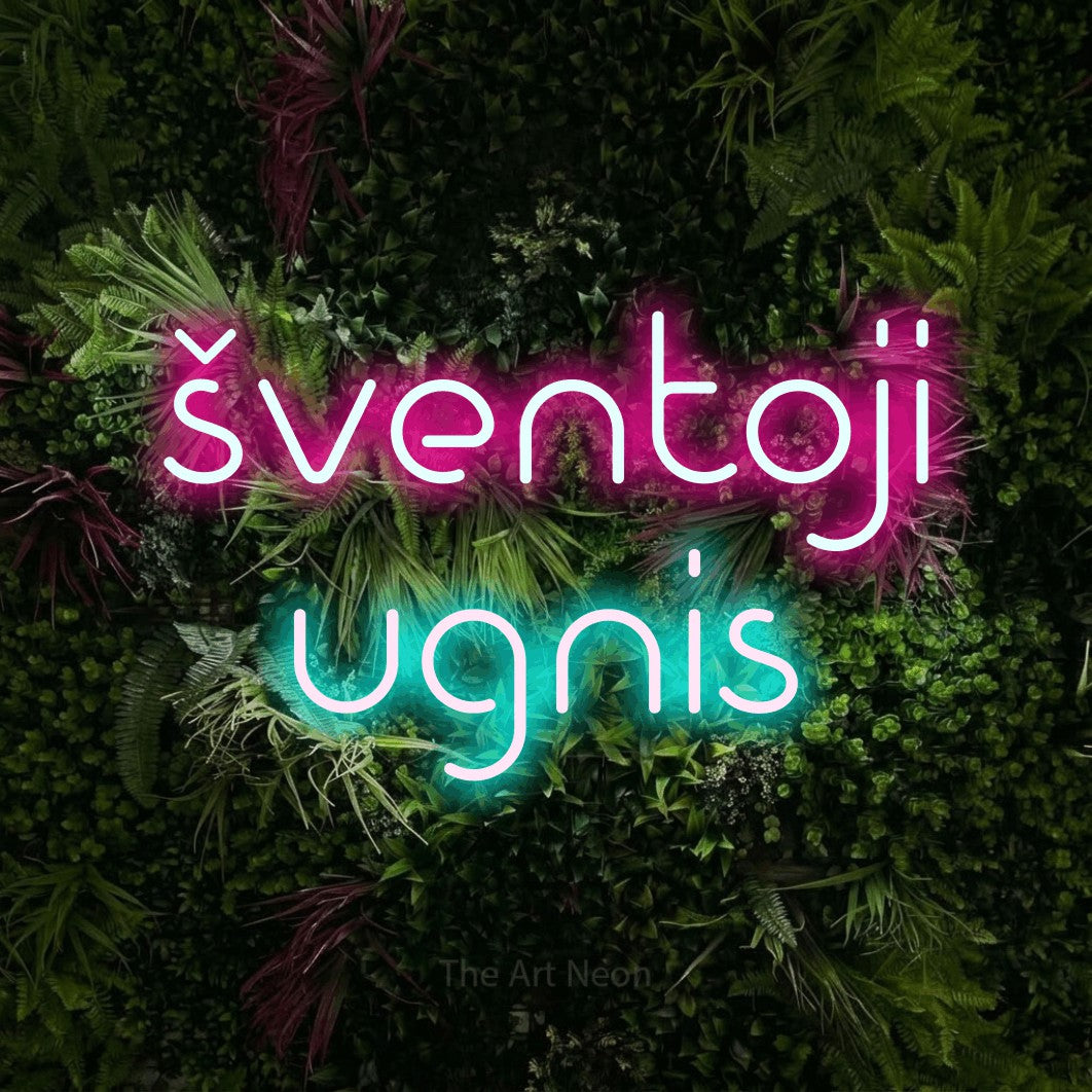 LED neon sign reading “šventoji ugnis”, arranged in two lines.
