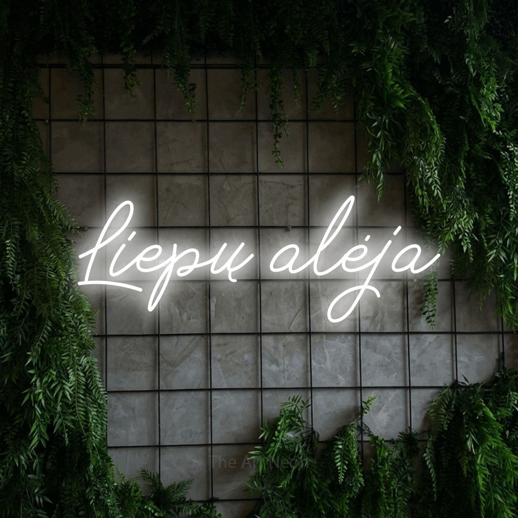 LED neon sign reading “Liepų alėja”, arranged in a single line.
