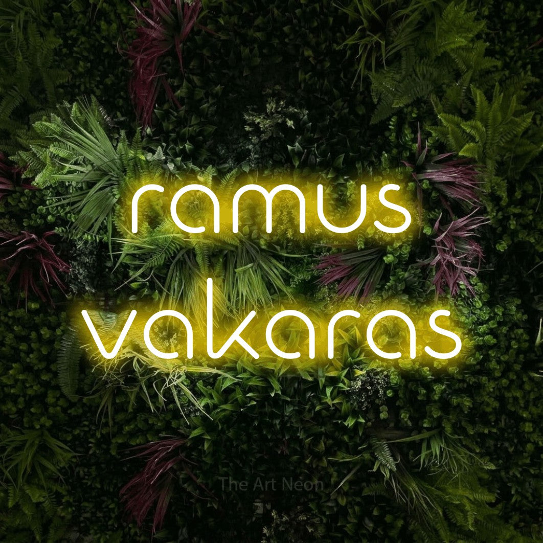 LED neon sign reading “ramus vakaras”, arranged in two lines.