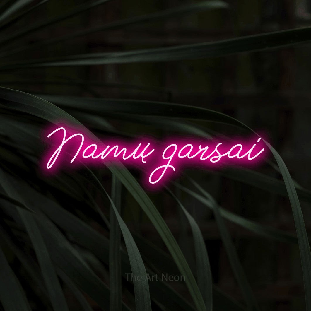 LED neon sign reading “Namų garsai”, arranged in a single line.