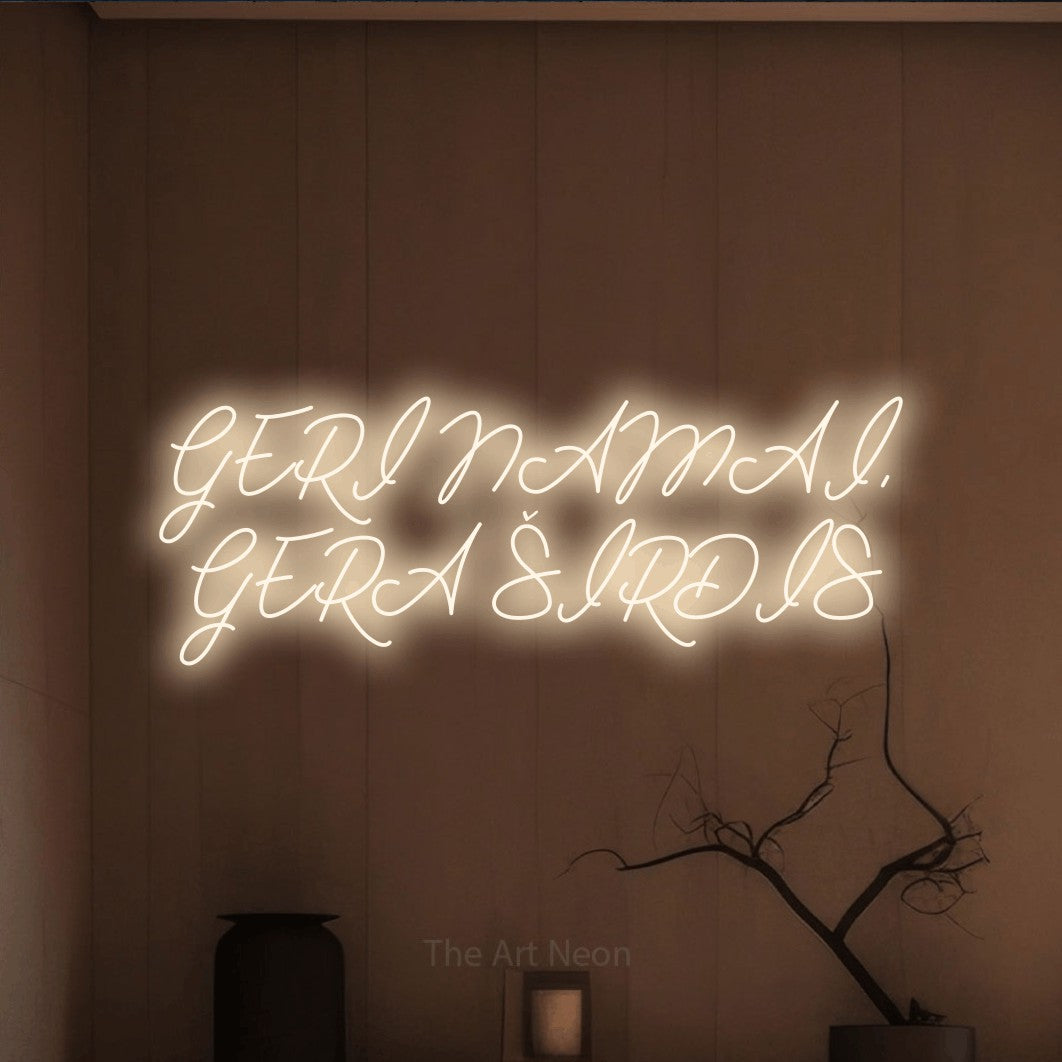 LED neon sign reading “GERI NAMAI, GERA ŠIRDIS”, arranged in two lines.