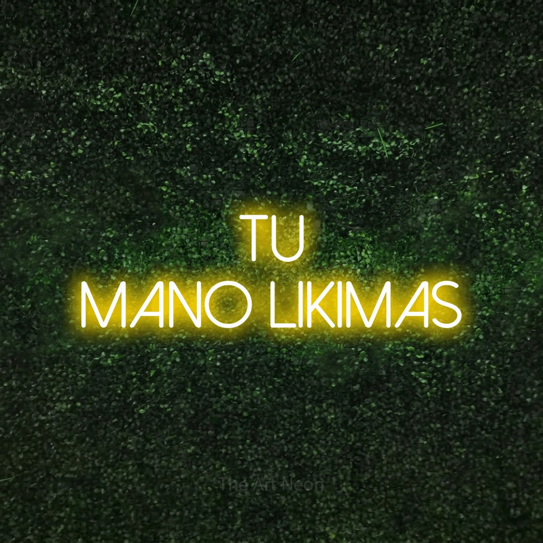 LED neon sign reading “tu — mano likimas”, arranged in two lines.