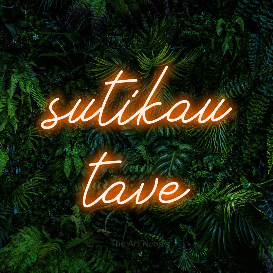 LED neon sign reading “sutikau tave”, arranged in two lines.
