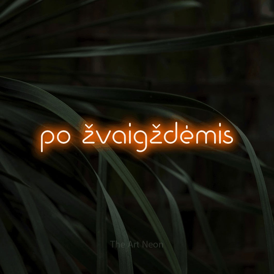 LED neon sign reading “po žvaigždėmis”, arranged in a single line.