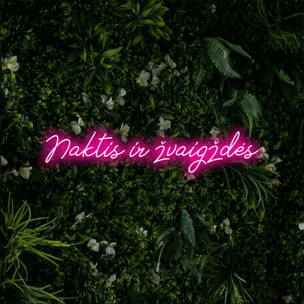 LED neon sign reading “Naktis ir žvaigždės”, arranged in a single line.