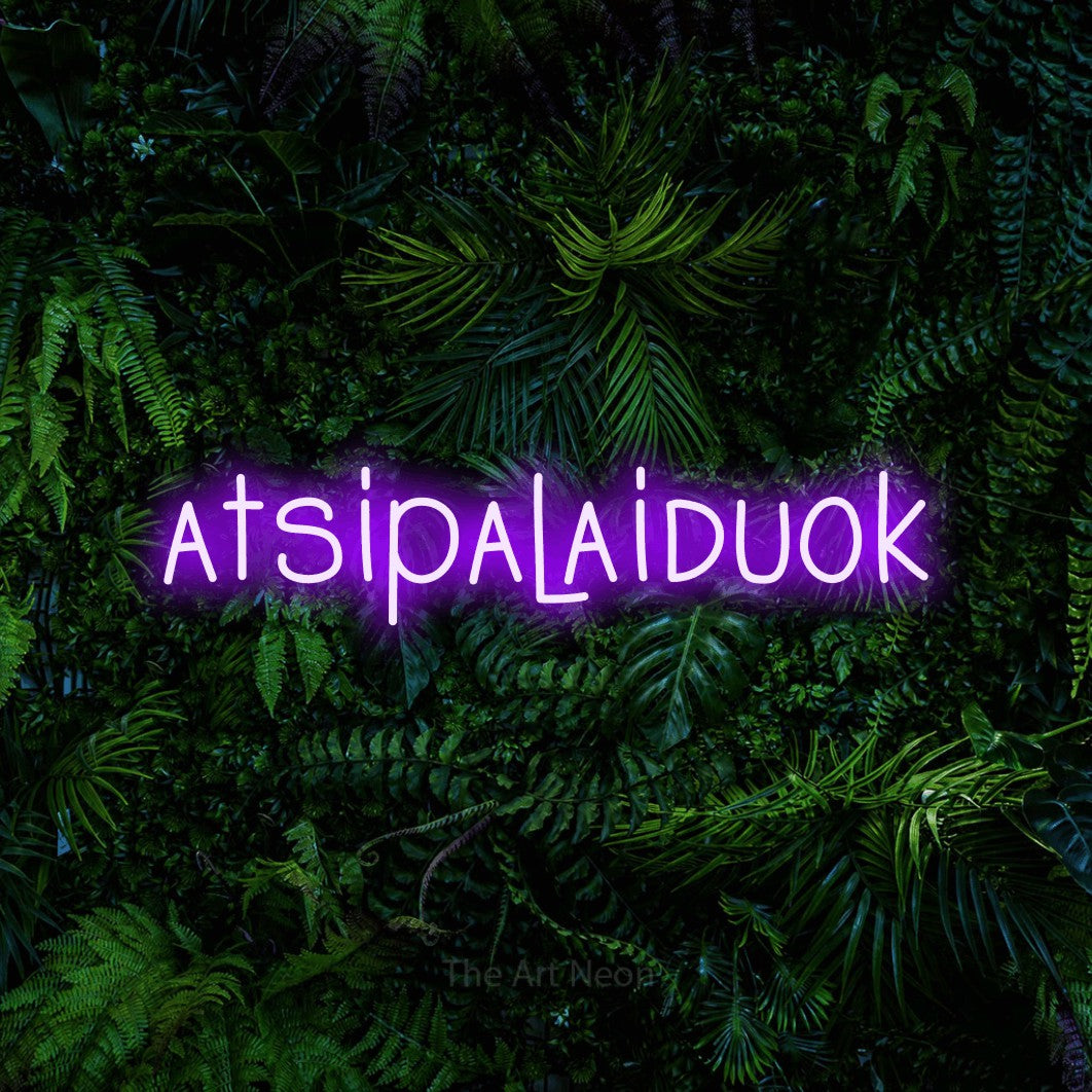 LED neon sign reading “atsipalaiduok”, arranged in a single line.