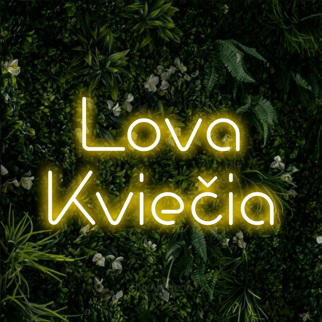 LED neon sign reading “Lova Kviečia”, arranged in two lines.