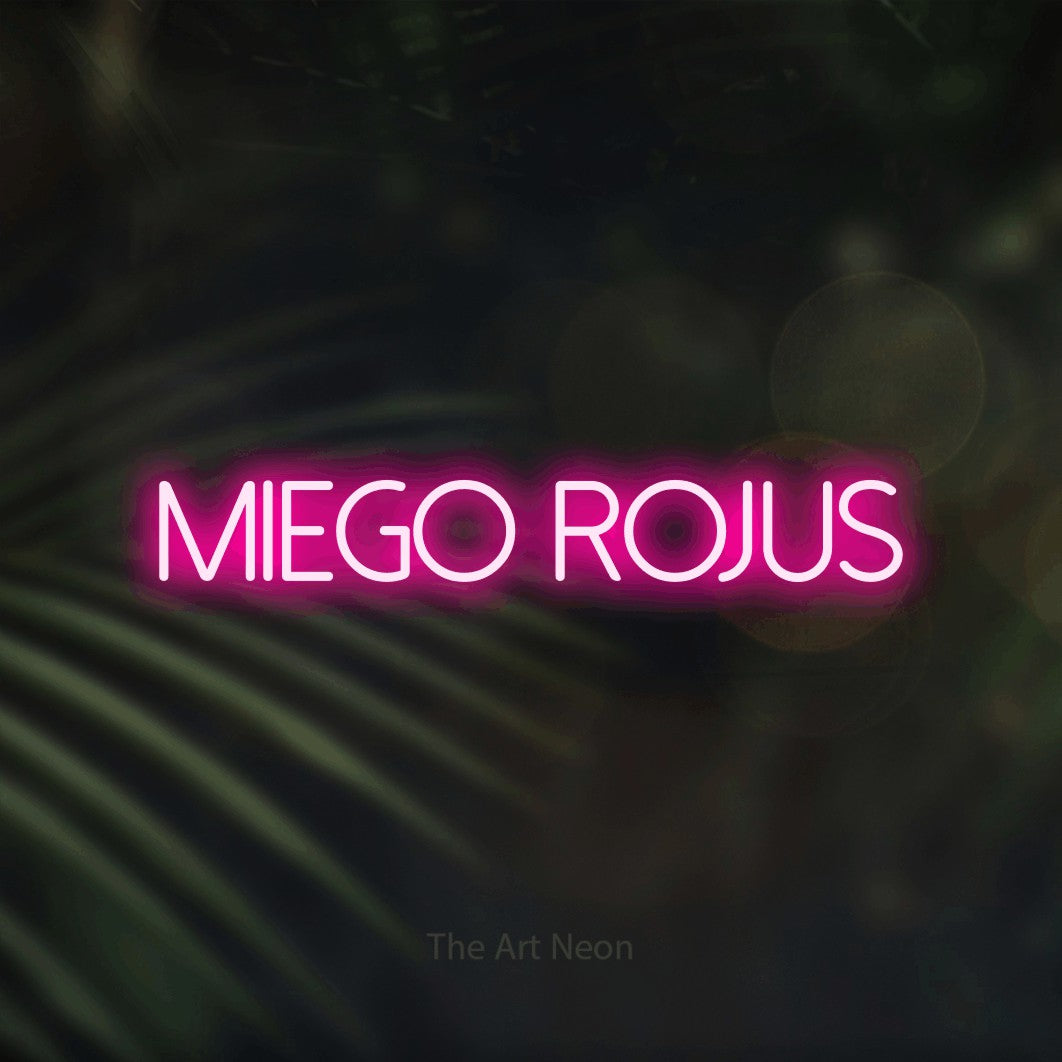 LED neon sign reading “MIEGO ROJUS”, arranged in a single line.
