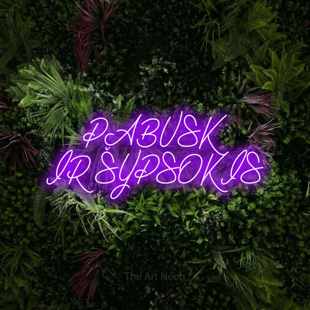 LED neon sign reading “PABUSK IR ŠYPSOKIS”, arranged in two lines.