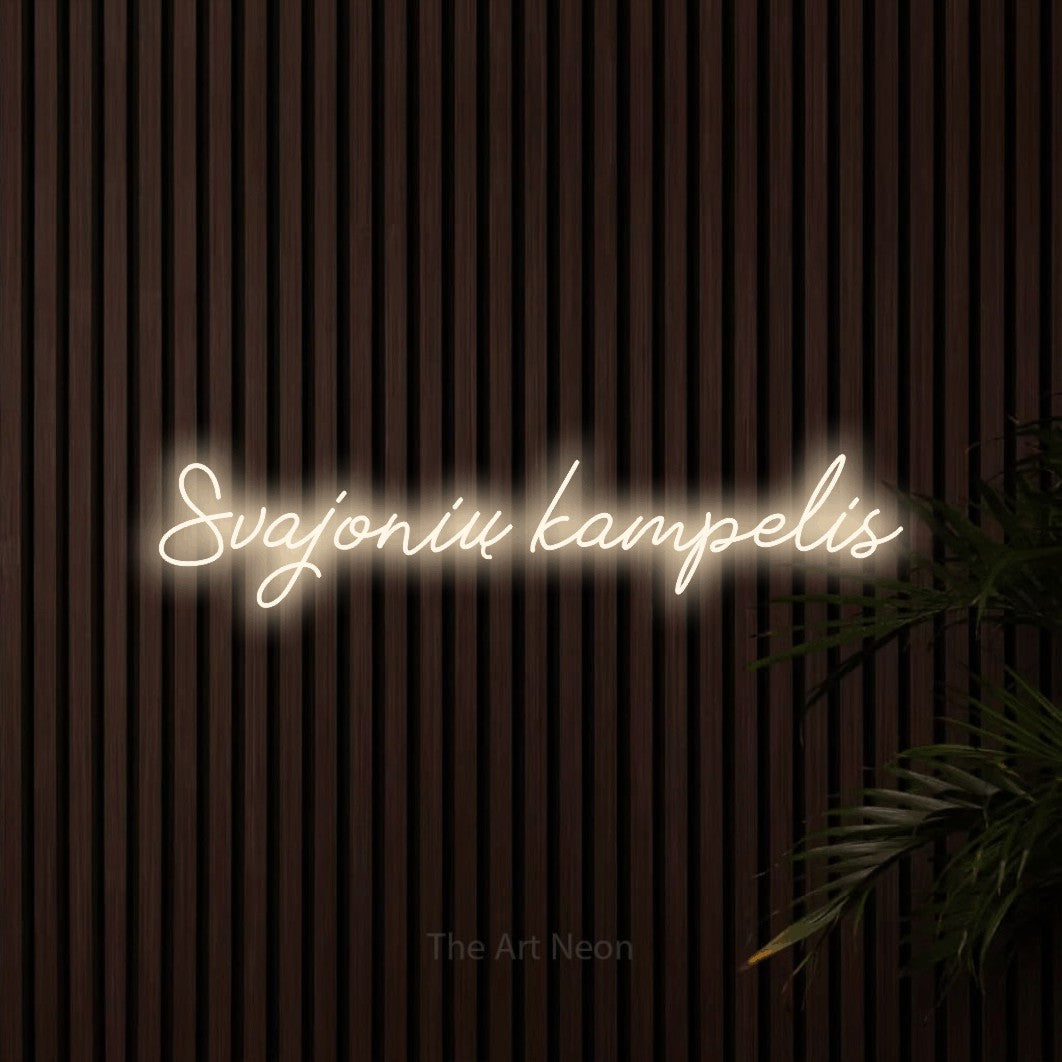 LED neon sign reading “Svajonių kampelis”, arranged in a single line.