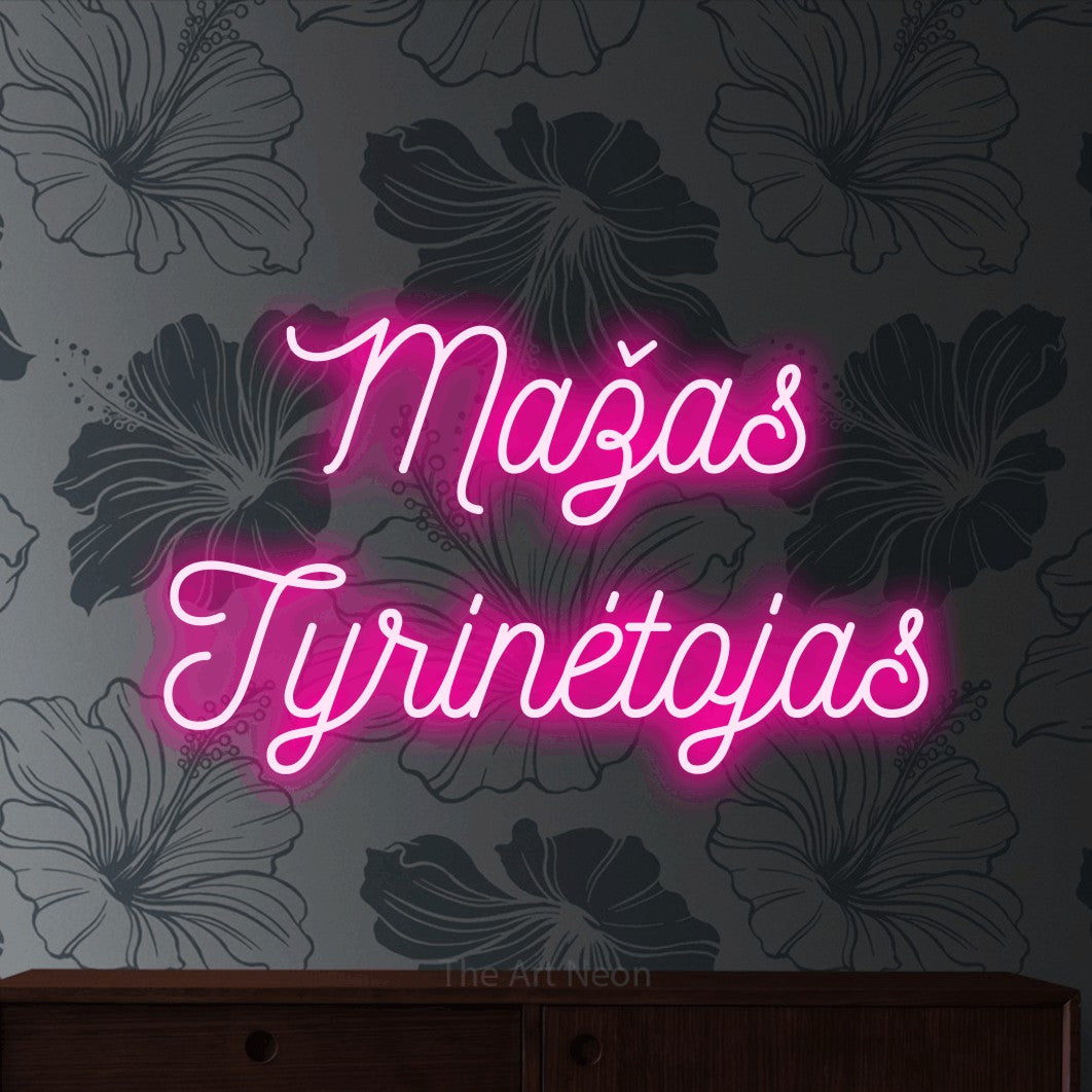 LED neon sign reading “Mažas Tyrinėtojas”, arranged in two lines.