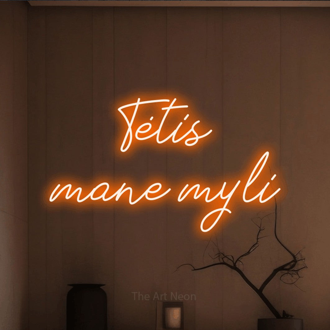 LED neon sign reading “Tėtis mane myli”, arranged in two lines.
