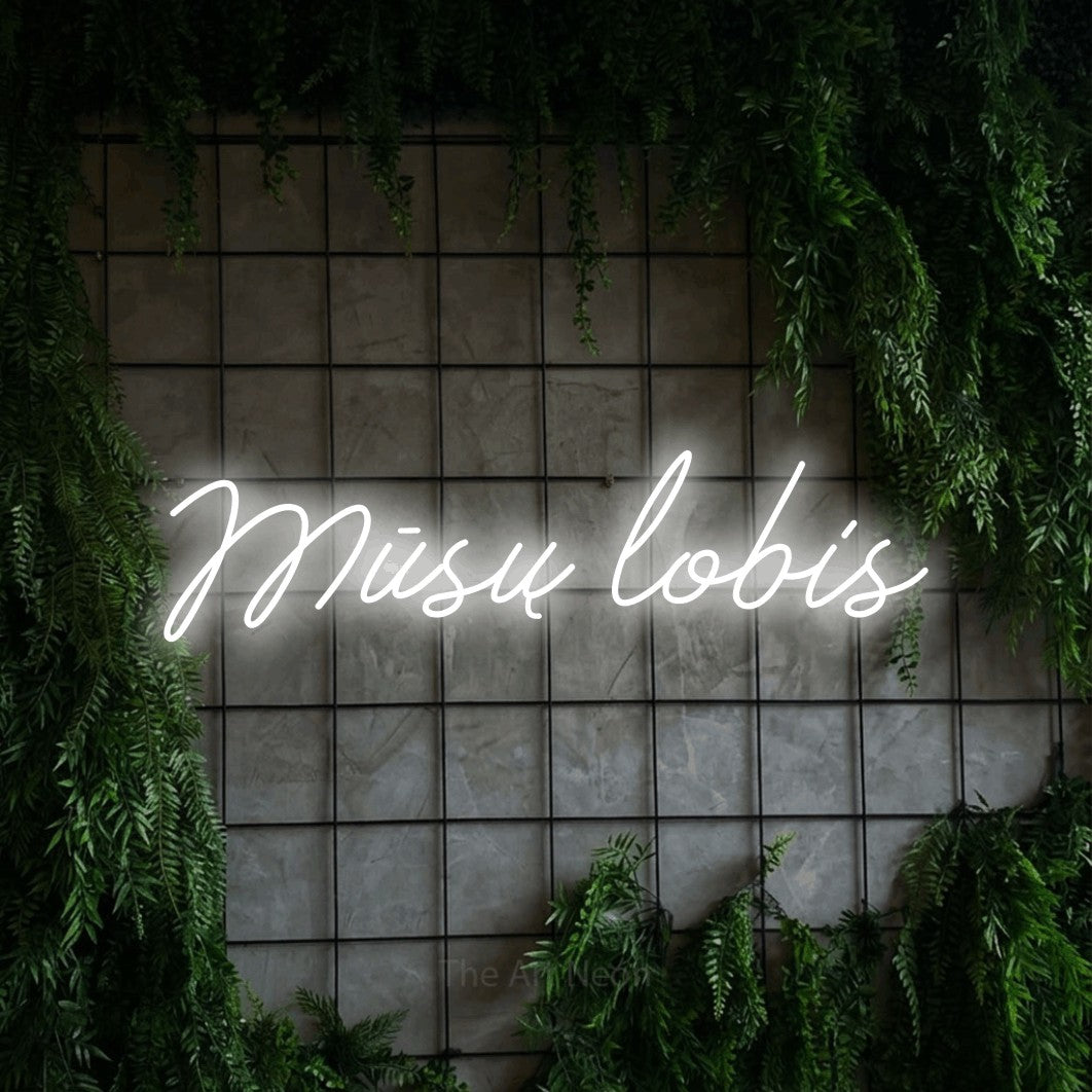LED neon sign reading “Mūsų lobis”, arranged in a single line.