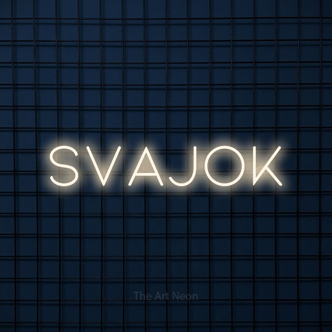 LED neon sign reading “svajok”, arranged in a single line.