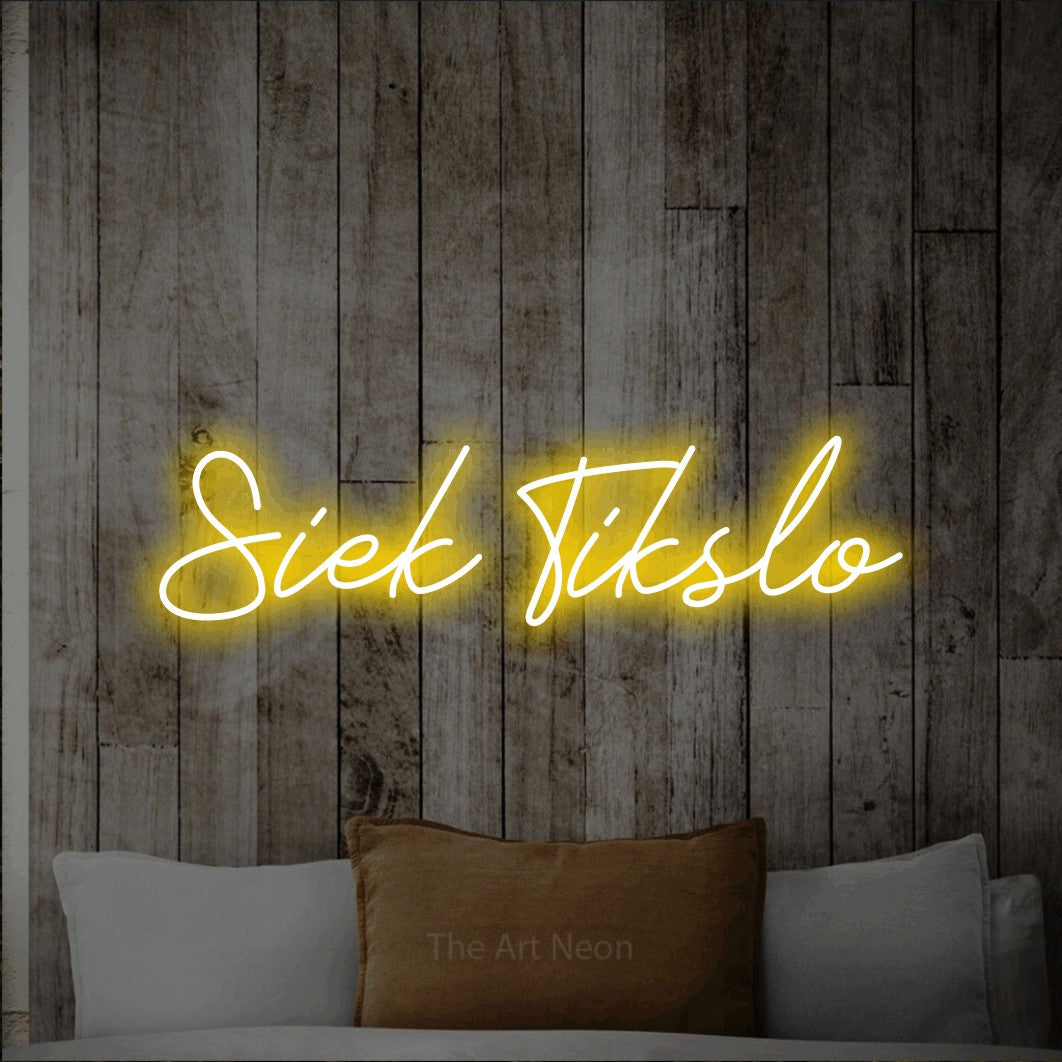 LED neon sign reading “Siek Tikslo”, arranged in a single line.