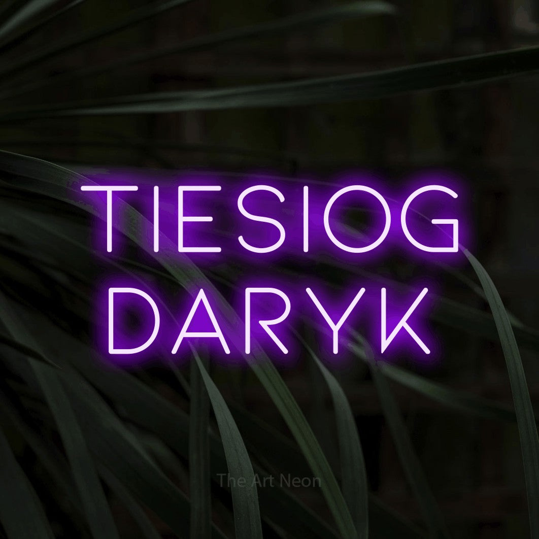 LED neon sign reading “Tiesiog Daryk”, arranged in two lines.