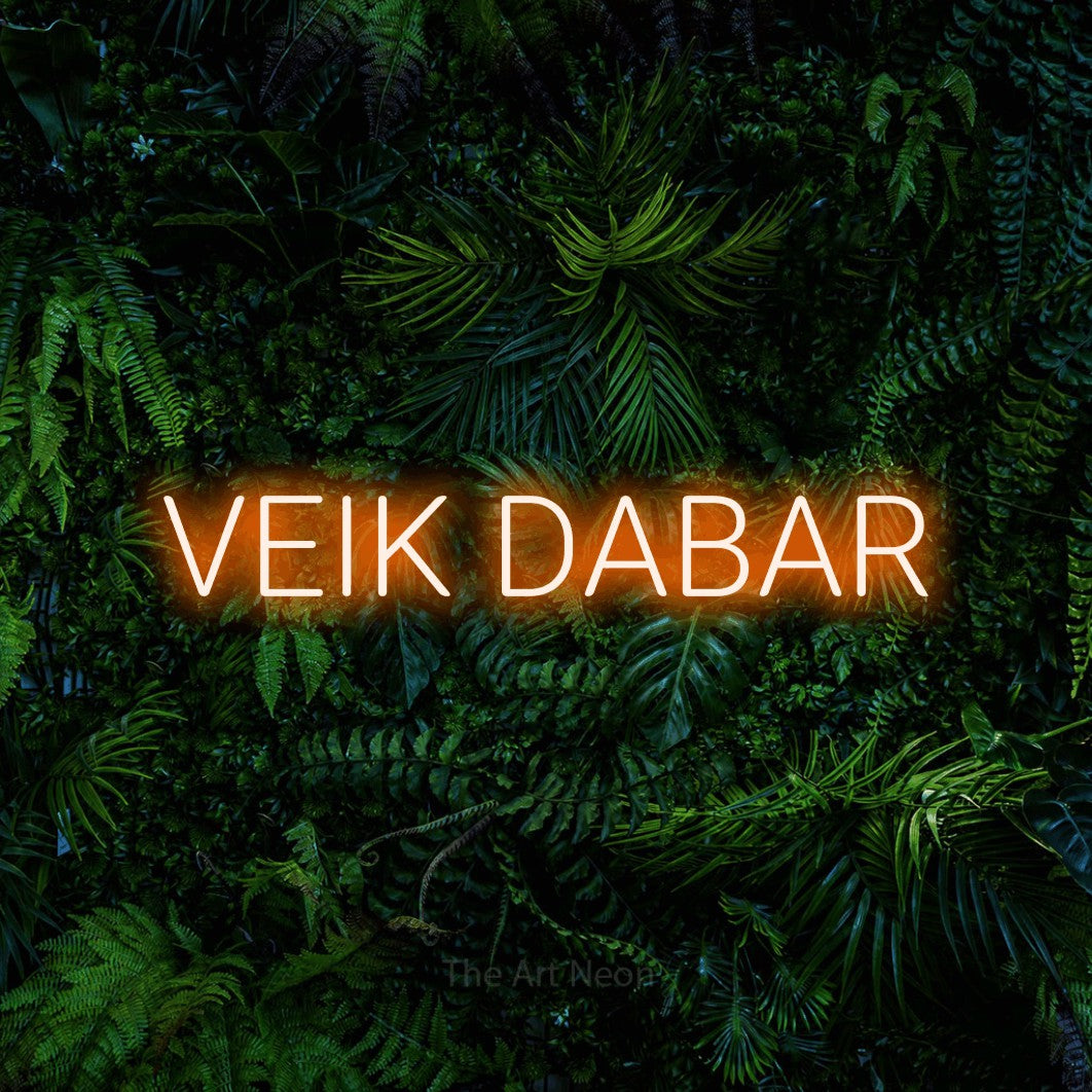 LED neon sign reading “VEIK DABAR”, arranged in a single line.