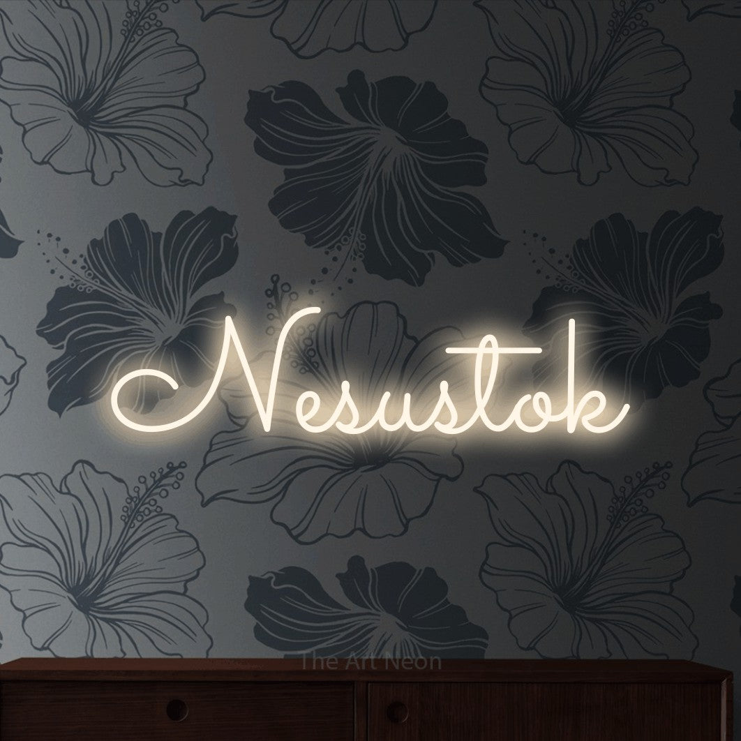LED neon sign reading “Nesustok”, arranged in a single line.