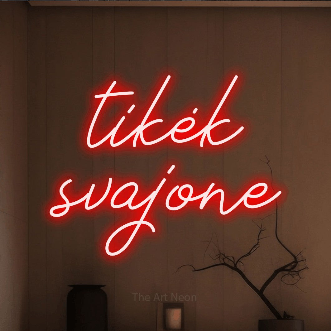 LED neon sign reading “tikėk svajone”, arranged in two lines.