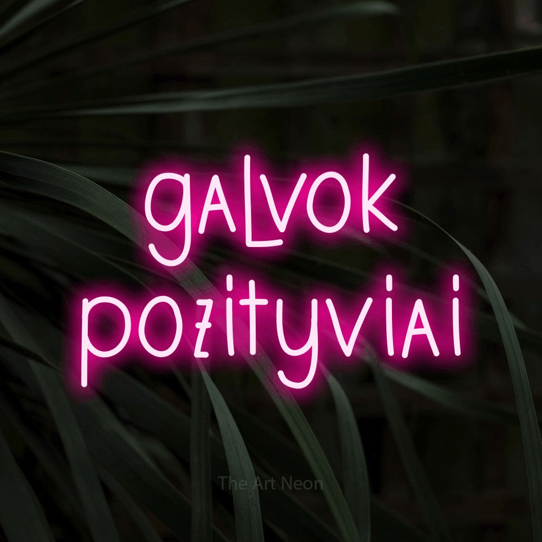 LED neon sign reading “galvok pozityviai”, arranged in two lines.