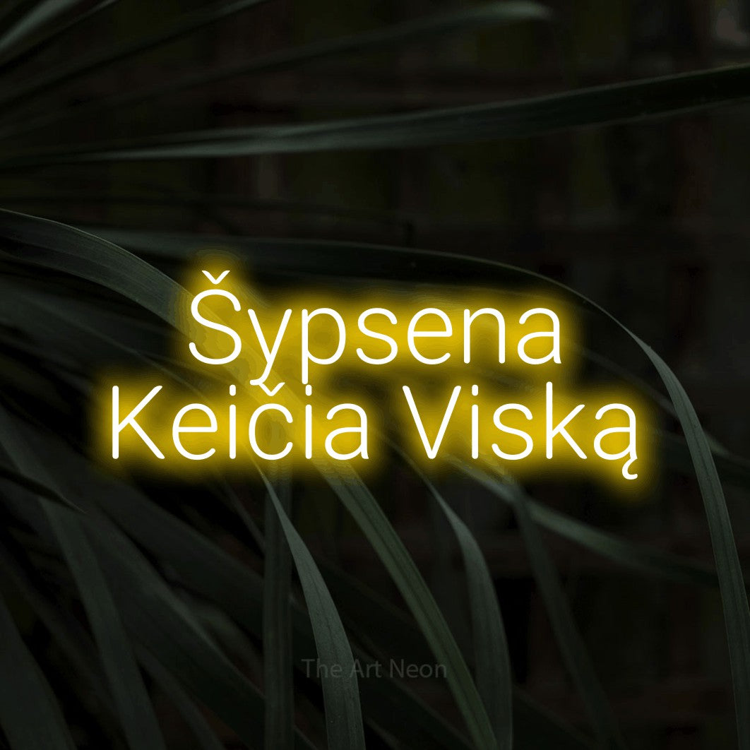 LED neon sign reading “Šypsena Keičia Viską”, arranged in two lines.