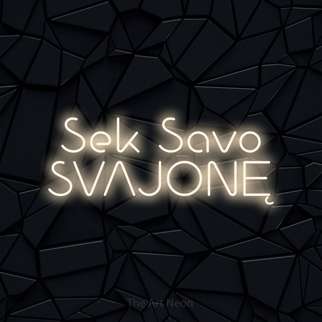 LED neon sign reading “Sek Savo SVAJONĘ”, arranged in two lines.