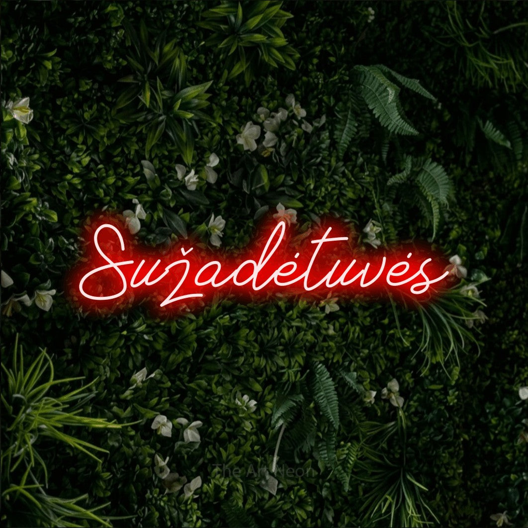 LED neon sign reading “Sužadėtuvės”, arranged in a single line.
