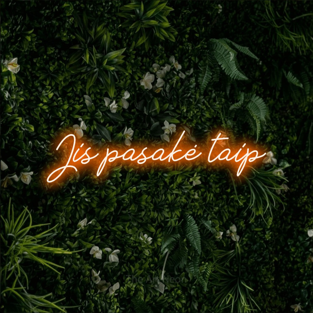 LED neon sign reading “Jis pasakė taip”, arranged in a single line.