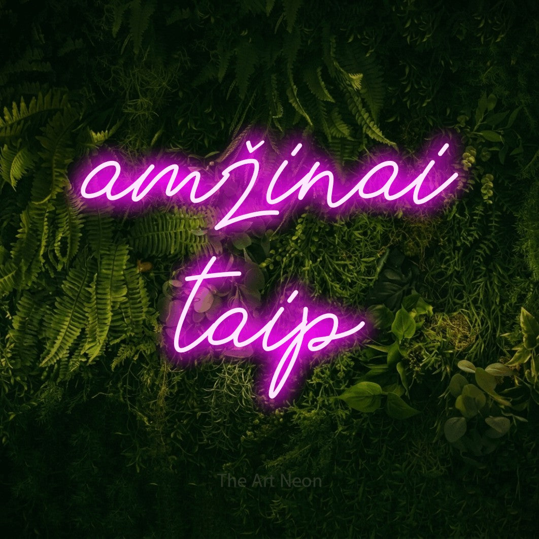 LED neon sign reading “amžinai taip”, arranged in two lines.