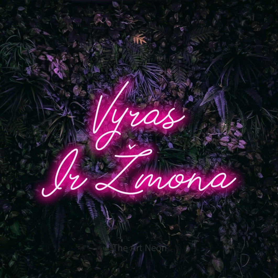 LED neon sign reading “Vyras Ir Žmona”, arranged in two lines.
