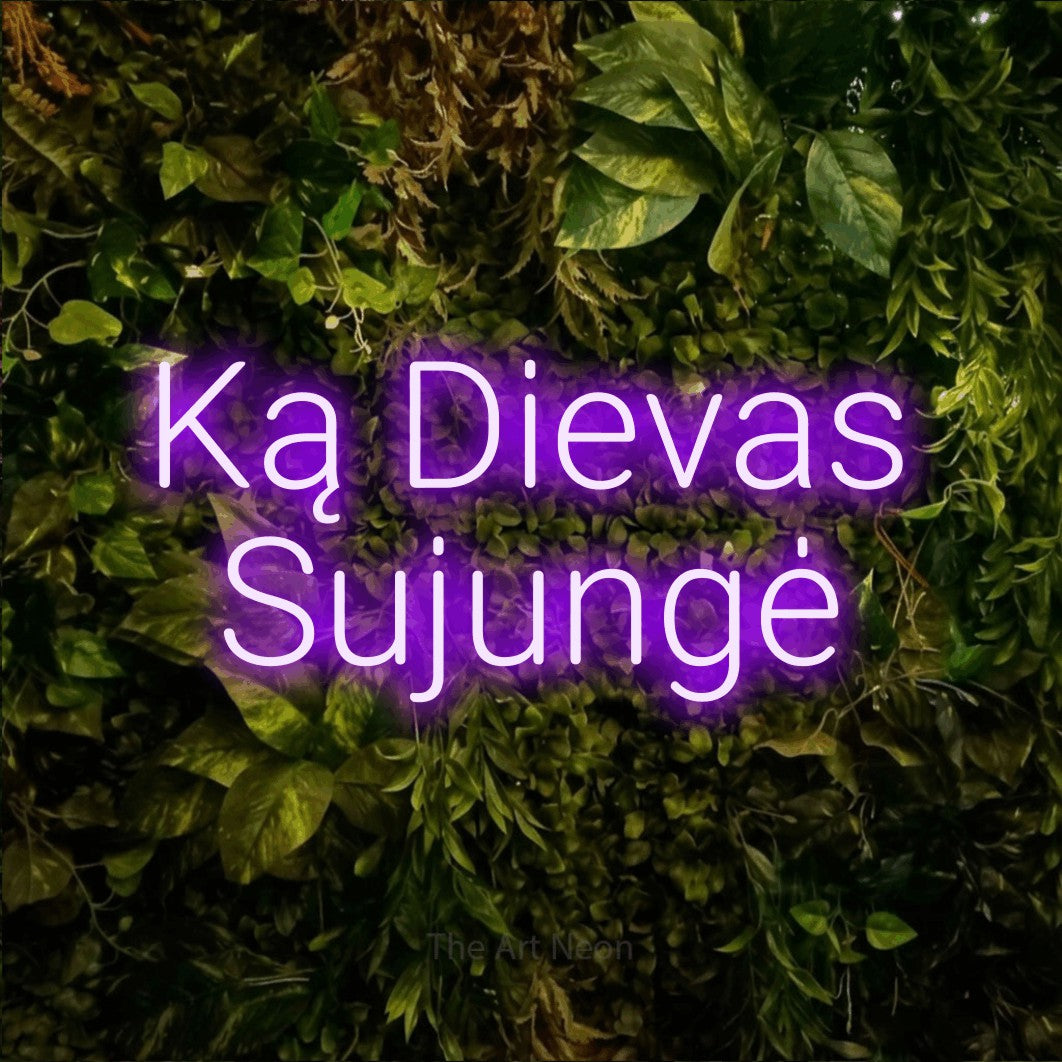 LED neon sign reading “Ką Dievas Sujungė”, arranged in two lines.