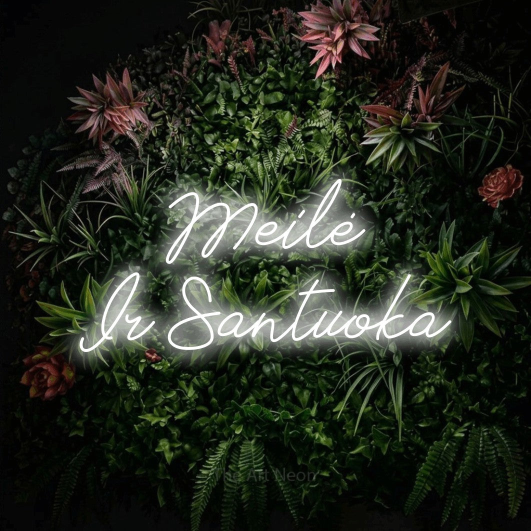 LED neon sign reading “Meilė Ir Santuoka”, arranged in two lines.
