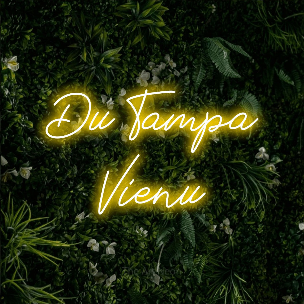 LED neon sign reading “Du Tampa Vienu”, arranged in two lines.