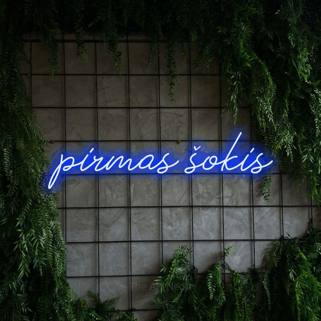 LED neon sign reading “pirmas šokis”, arranged in a single line.