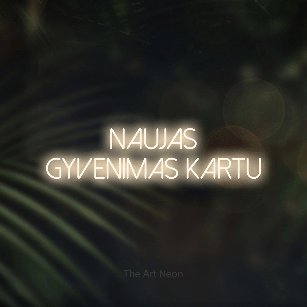 LED neon sign reading “naujas gyvenimas kartu”, arranged in two lines.