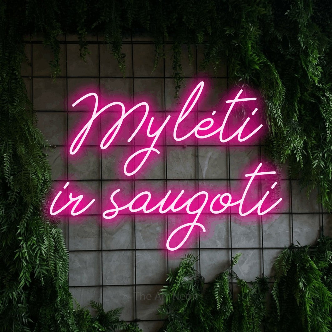 LED neon sign reading “Mylėti ir saugoti”, arranged in two lines.