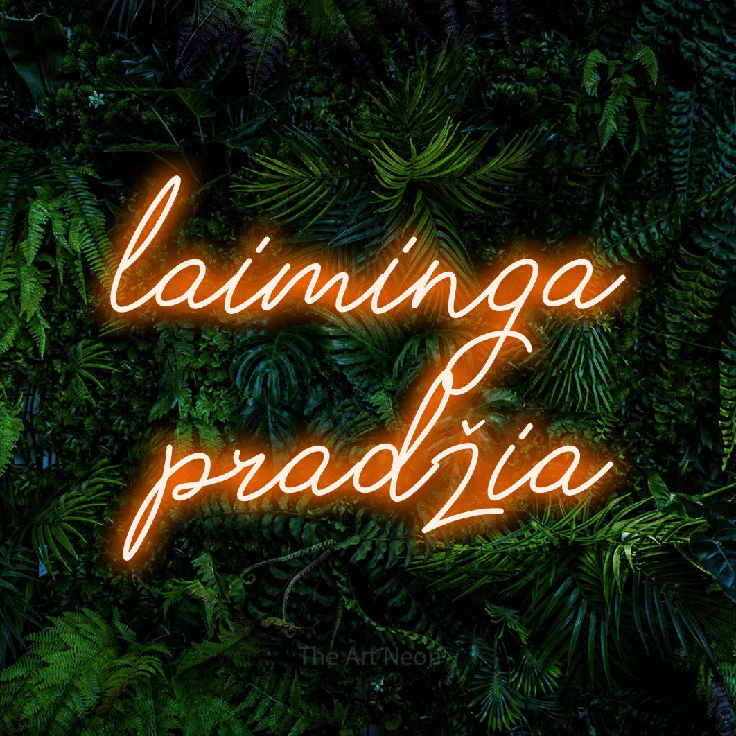 LED neon sign reading “laiminga pradžia”, arranged in two lines.