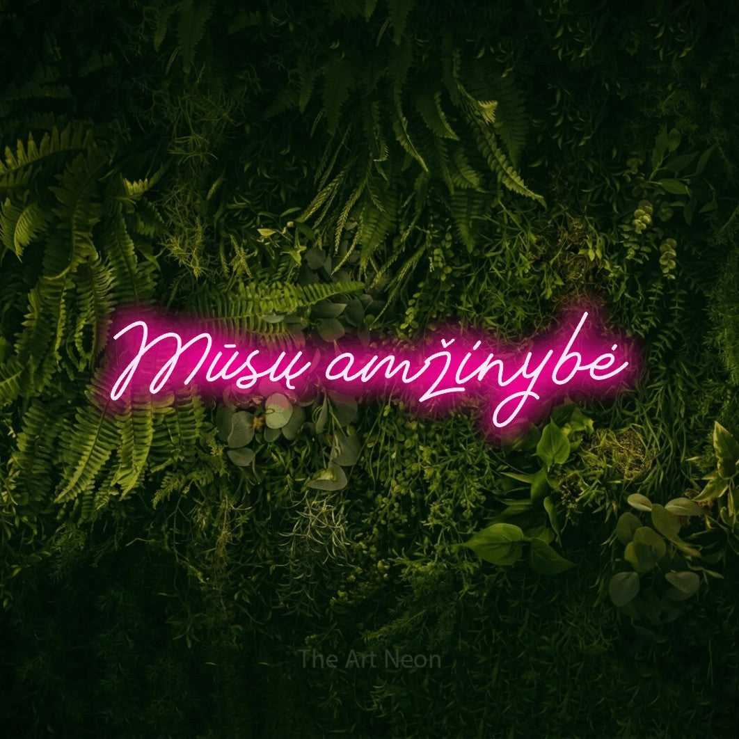 LED neon sign reading “Mūsų amžinybė”, arranged in a single line.