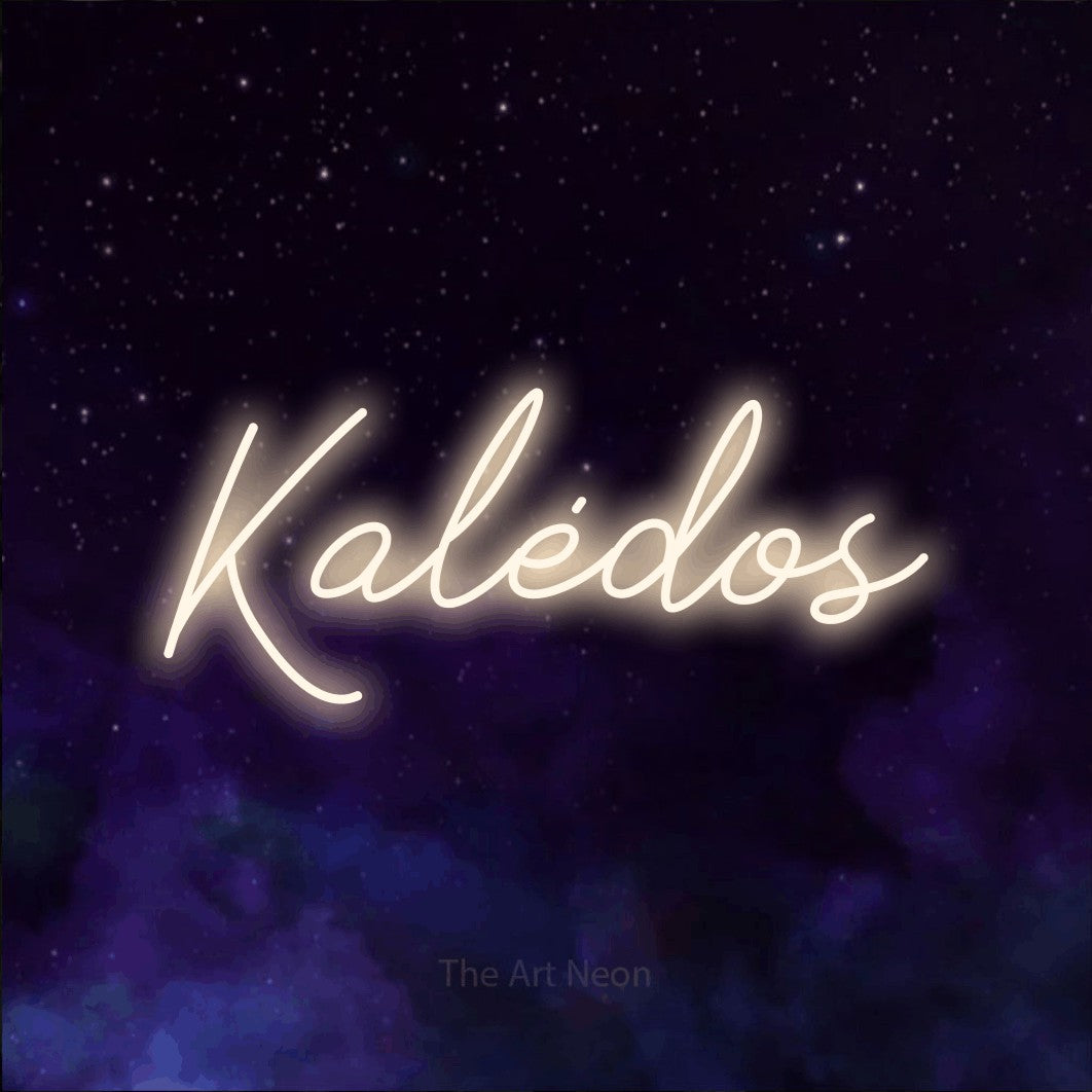 LED neon sign reading “Kalėdos”, arranged in a single line.