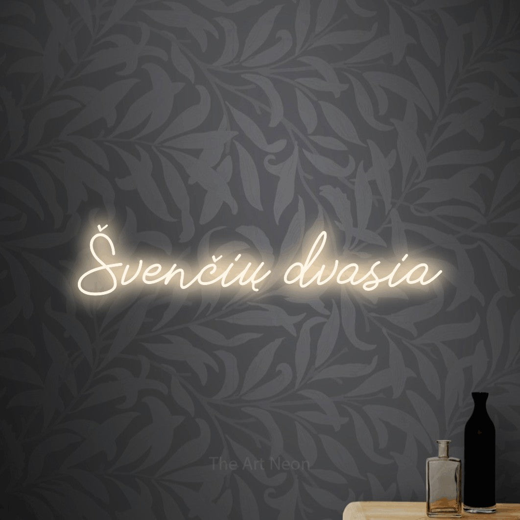 LED neon sign reading “Švenčių dvasia”, arranged in a single line.