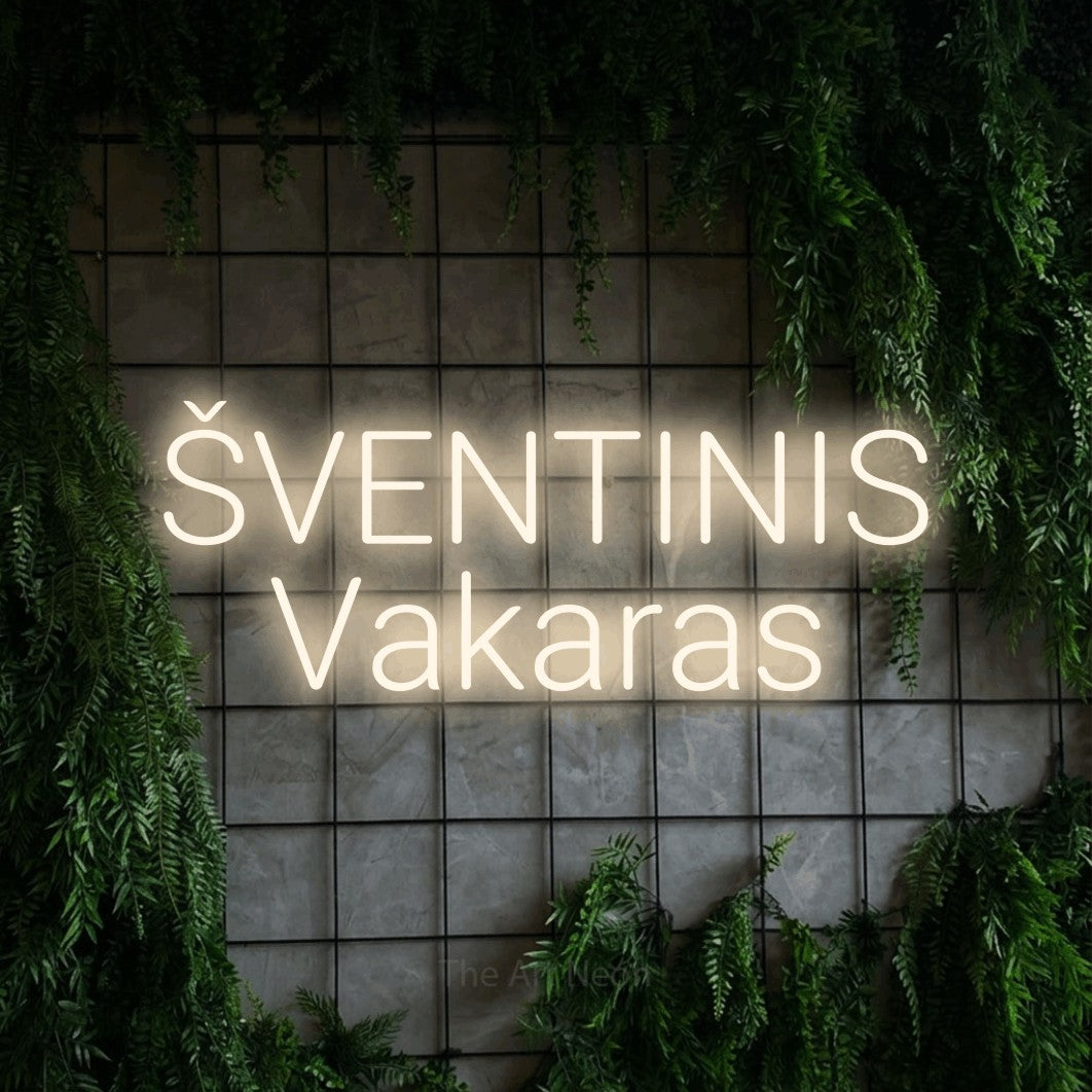 LED neon sign reading “ŠVENTINIS Vakaras”, arranged in two lines.