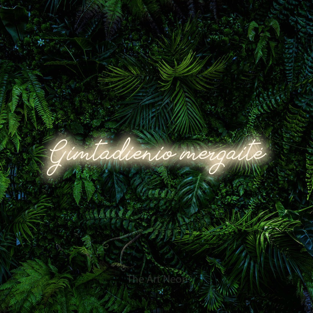 LED neon sign reading “Gimtadienio mergaitė”, arranged in a single line.