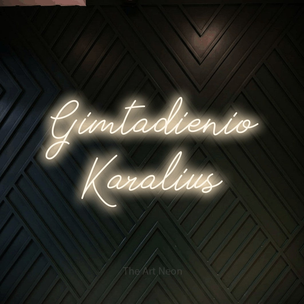 LED neon sign reading “Gimtadienio Karalius”, arranged in two lines.