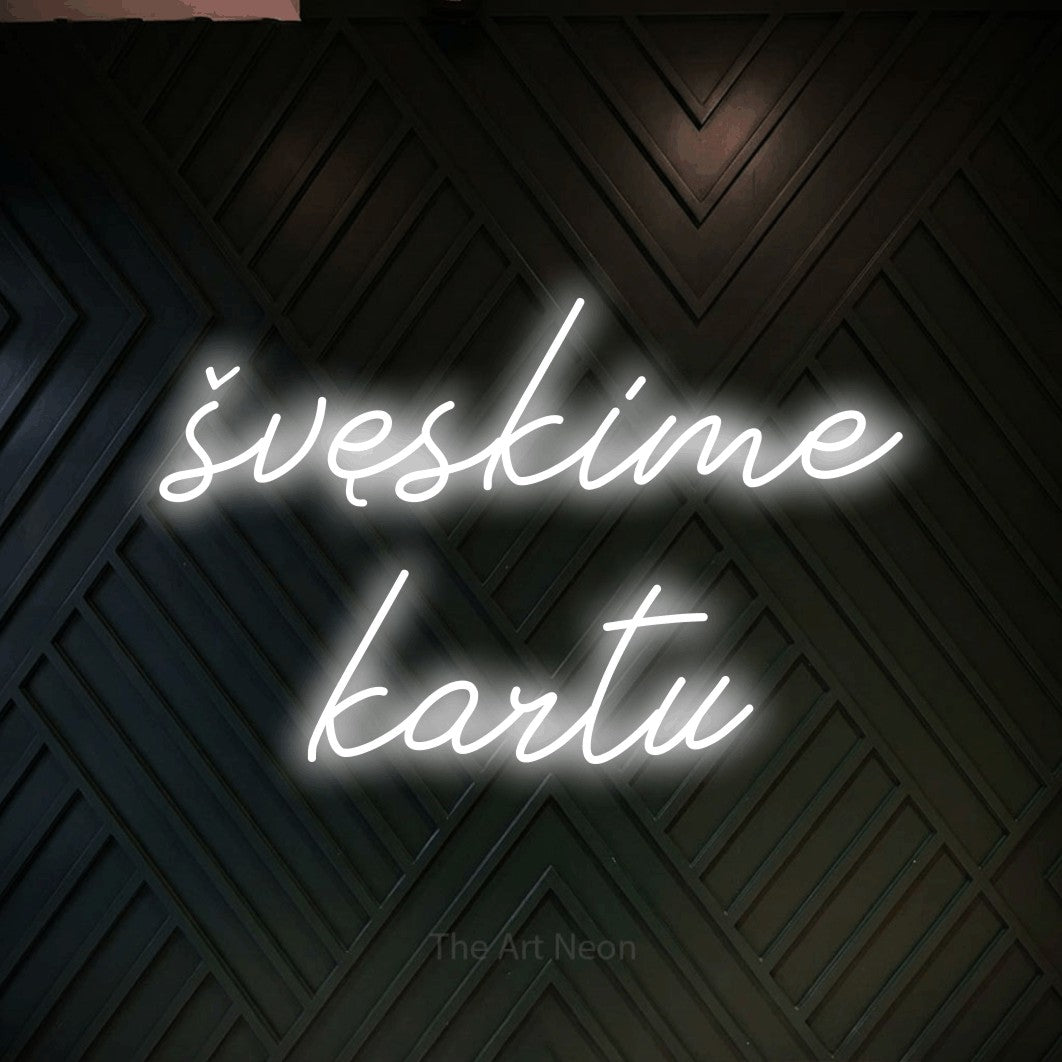 LED neon sign reading “švęskime kartu”, arranged in two lines.