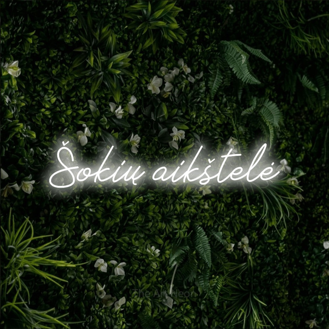 LED neon sign reading “Šokių aikštelė”, arranged in a single line.